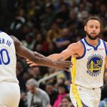 Oct 30, 2025; Milwaukee, Wisconsin, USA; Golden State Warriors guard Stephen Curry (30) reacts with forward Jimmy Butler (10) after scoring a basket in the 3rd quarter against the Milwaukee Bucks at Fiserv Forum. Mandatory Credit: